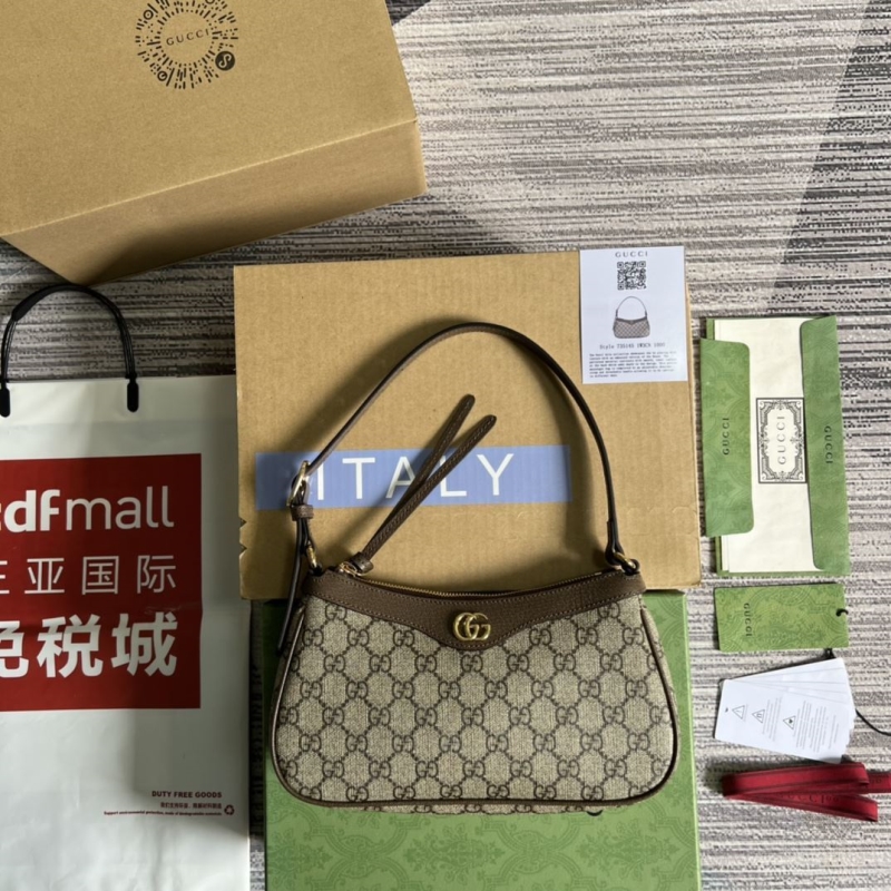 G*u*i top handle bags